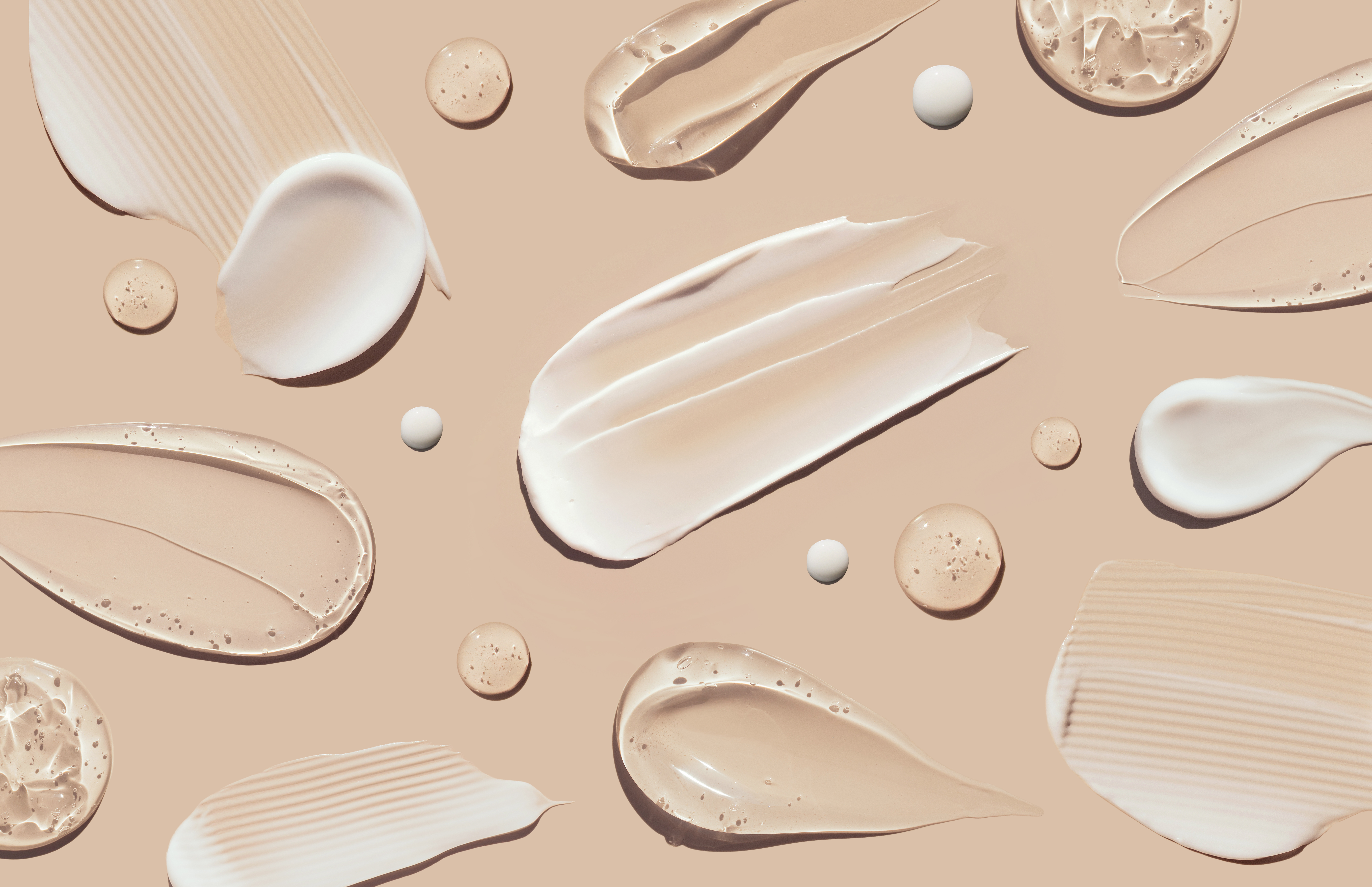 Cosmetic cream on a brown background